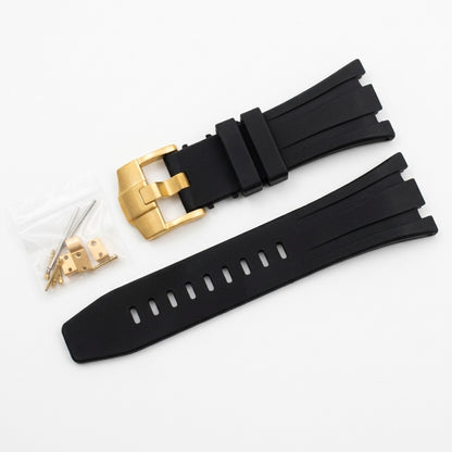 Seikoak rubber strap in black with gold buckle
