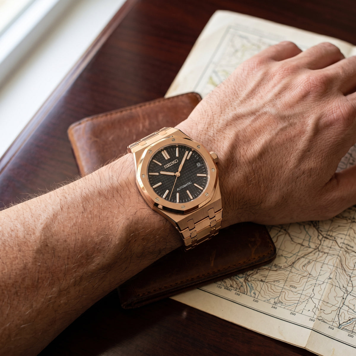 Seikoak Black and Rose Gold Seiko mod watch – black dial, wrist shot