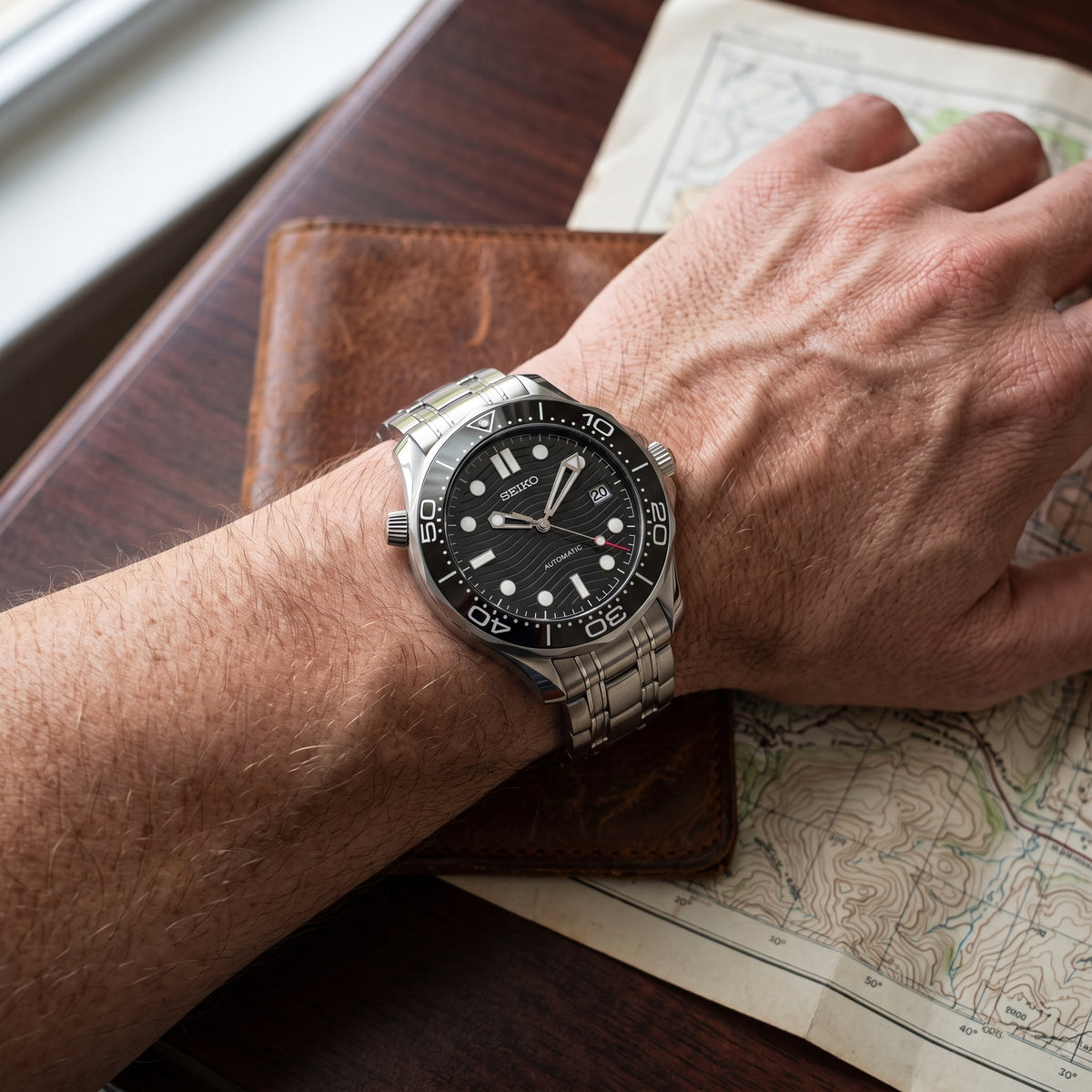 Seikomaster Black Seiko mod watch – black wave dial, wrist shot